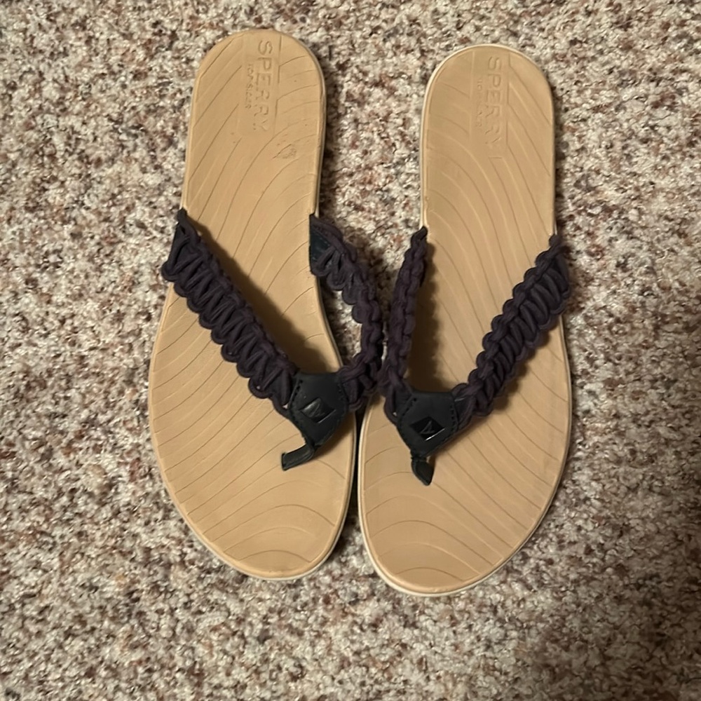 Sperry top sider sandals size 7 1/2 worn a few times. Dark navy tan footbed